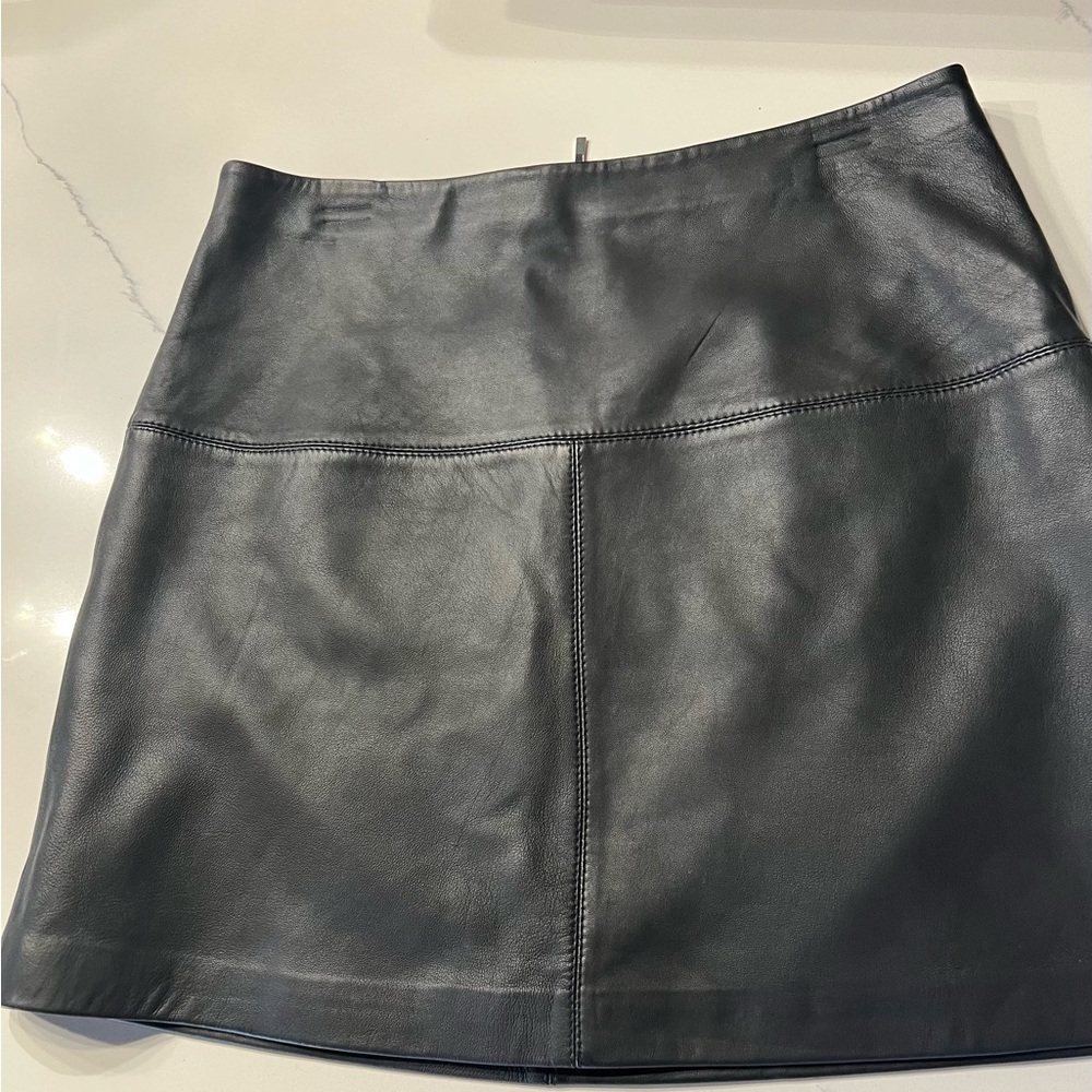 Brand new Ted Baker leather mini skirt, feels like butter with cute A-line fit.
